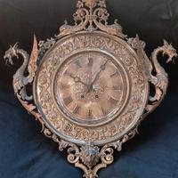 Orologio a muro antico in ottone