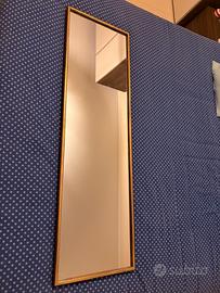 Specchio con cornice dorata mai usato