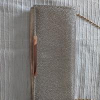 Pochette elegante oro