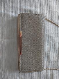 Pochette elegante oro
