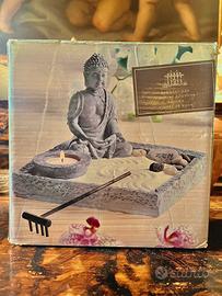 zen decorativo con Buddha, candela e sabbia