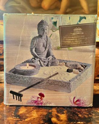 zen decorativo con Buddha, candela e sabbia