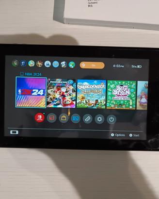 Nintendo Switch pari al nuovo con accessori nuovi 