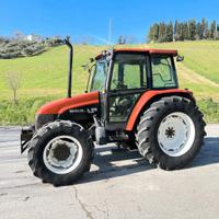 New Holland L 95 con lama da neve e freni ad aria