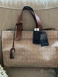 Borsa nuova ma usata con poschette