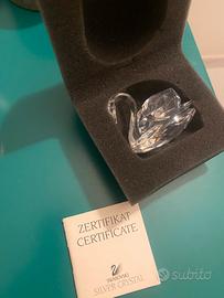 Cingo Swaroski originale con certificato.