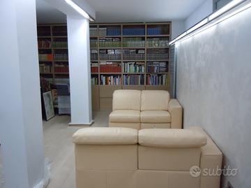 Libreria marca PIANCA colore rovere chiaro.