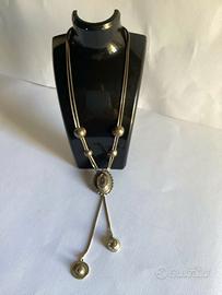Rara collana vintage con capello cowboy