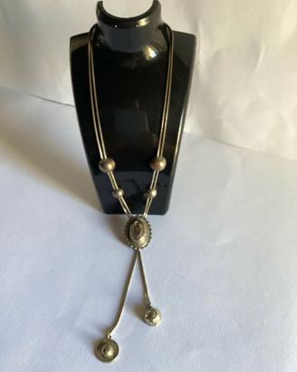 Rara collana vintage con capello cowboy
