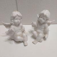 Statuette in porcellana bianca Vintage