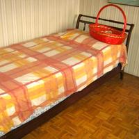 Letto a barca in legno