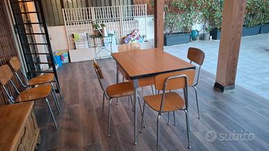 tavolo con sei sedie stile vintage industriale