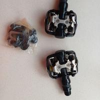 Pedali e tacchette bici