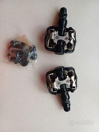 Pedali e tacchette bici