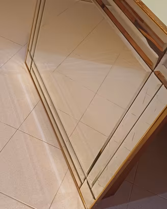 Specchio con cornice bisellata