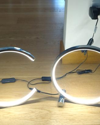 Coppia lampade da tavolo LED moderne a mezzaluna