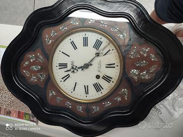 Orologio a pendolo a occhio di bue