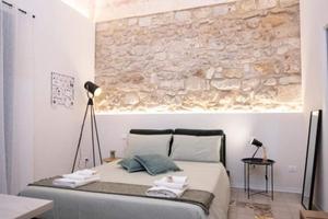 Camere con bagno privato a studenti universitari