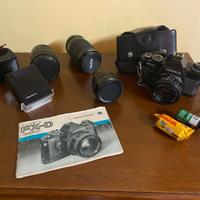 Reflex 35 mm  Yashica FX-D Quartz con accessori