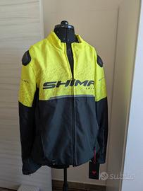 caschi e giubbotto giacca moto