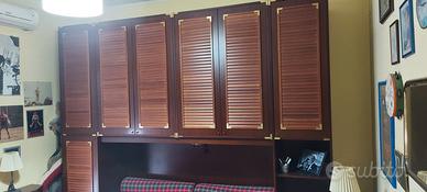 Armadio 6 ante con letto a ponte e cassettoni