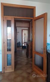 Porta in Legno massello con Vetri e Sopraluce