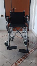 Sedia a rotelle pieghevole ,facile da trasportare