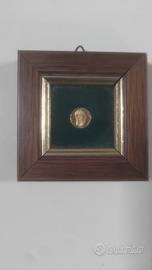 La più piccola moneta del mondo Gold palte