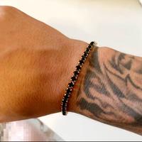 Bracciale tennis nero e oro