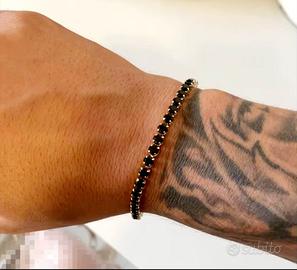 Bracciale tennis nero e oro