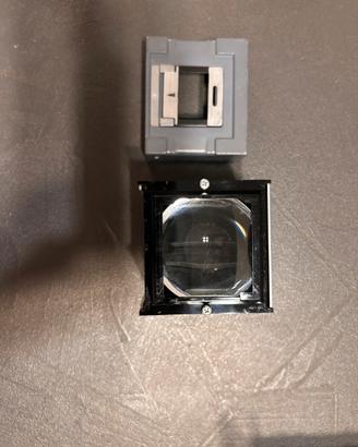 Pezzo di ricambio per ingranditore