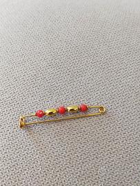 Spilla oro