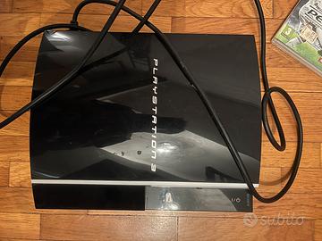 Play station 3,volante, 17 giochi , telecamera ,