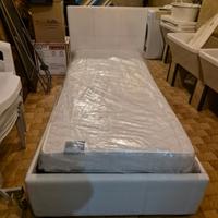 letto bianco con contenitore