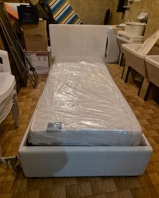 letto bianco con contenitore