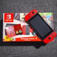 Nintendo Switch Mario Odyssey + case + 2 giochi...