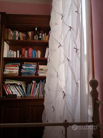 tende cucite da una sarta 