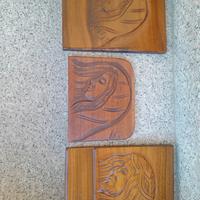 3 intagli su legno di noce 