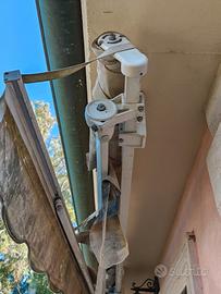 tenda da sole a bracci con telo rotto