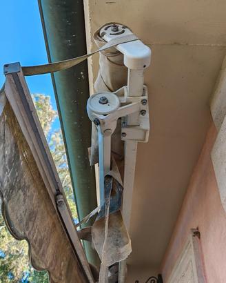 tenda da sole a bracci con telo rotto
