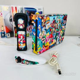 Nintendo Wii con Skin + Controller  + 5 giochi