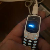 Micro telefono peso 12 g