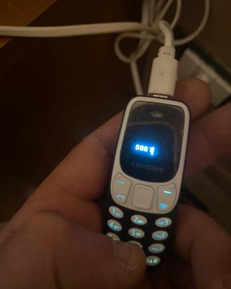 Micro telefono peso 12 g