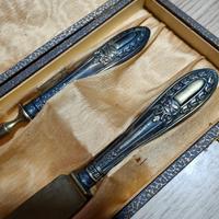set forchettone e coltello in argento 