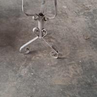 Base/supporto in ferro battuto