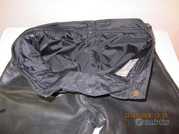 tuta per moto in pelle e pezzi