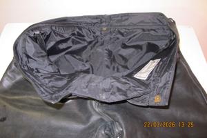 tuta per moto in pelle e pezzi