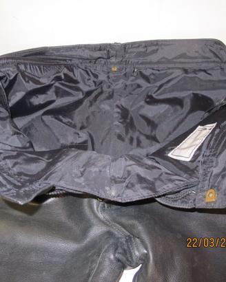 tuta per moto in pelle e pezzi