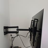 Supporto tv a due bracci, fino a 60 pollici.