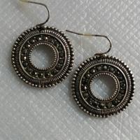 Orecchini tondi in zama e stardust